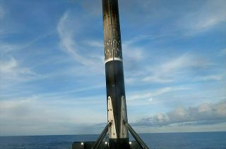A SpaceX Falcon 9 rocket's first stage lands on the droneship "A Shortfall of Gravitas" on Sunday, Nov. 12, 2023.
