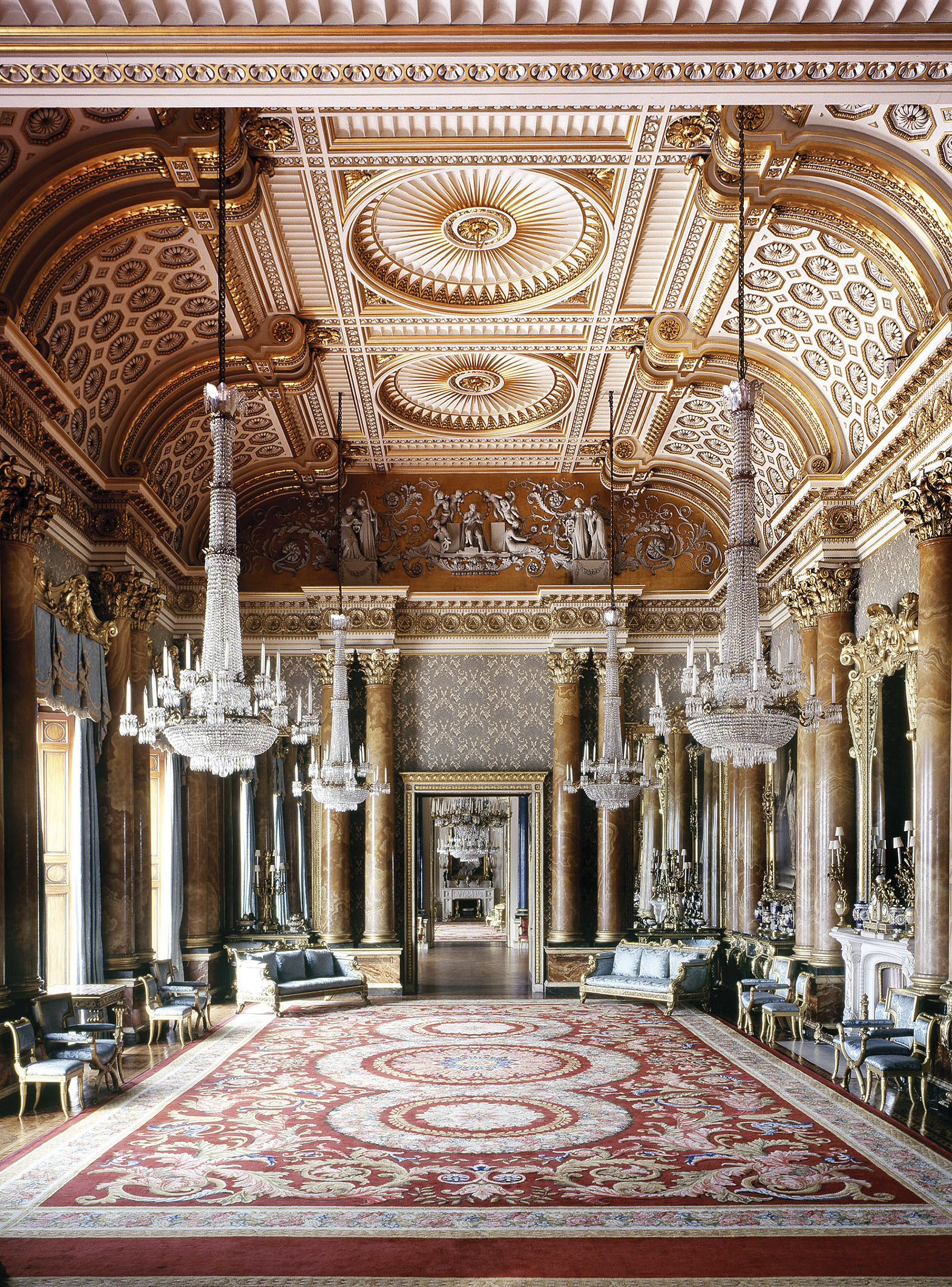 Red, white and gold gilt state room at Buckingham Palace