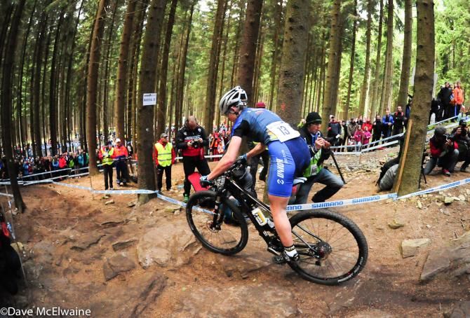 Tanja Zakelj (Unior Tools Team) riding a rocky trail while in third place
