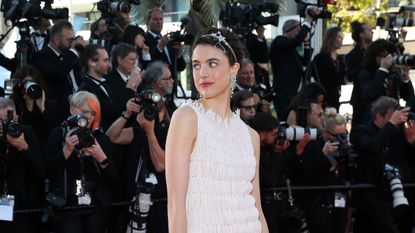 margaret qualley in a bedazzled headband at cannes