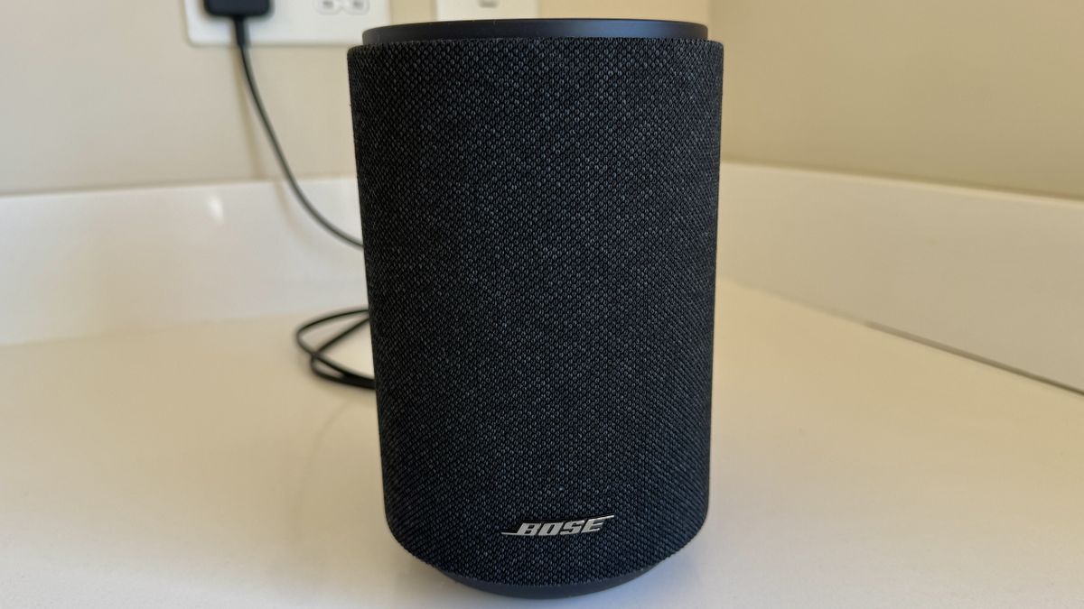 Bose Lifestyle Ultra speaker on a white table