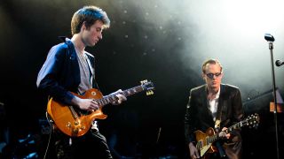 Jack Moore onstage with Joe Bonamassa in 2011