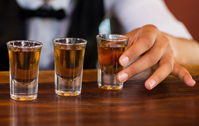 Tequila in shot glasses on a bar