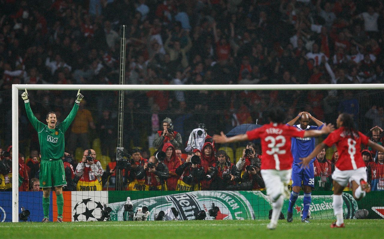 Carlos Tevez and Anderson of Manchester United run to celebrate with jubilant goalkeeper Edwin van der Sar, after he saved the decisive penalty from Chelsea's Nicolas Anelka - who walks away with his hands on his head - during the shootout in the 2008 Champions League final at the Luzhniki Stadium in Moscow, Russia