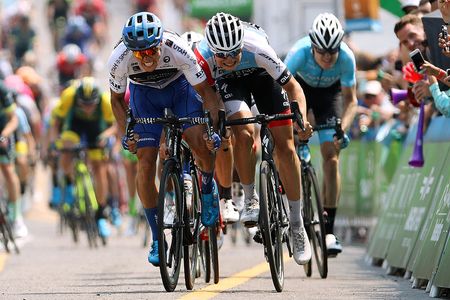 Travis McCabe (UnitedHealthcare) and Jasper Philipsen (Hagens Berman Axeon) go shoulder to shoulder