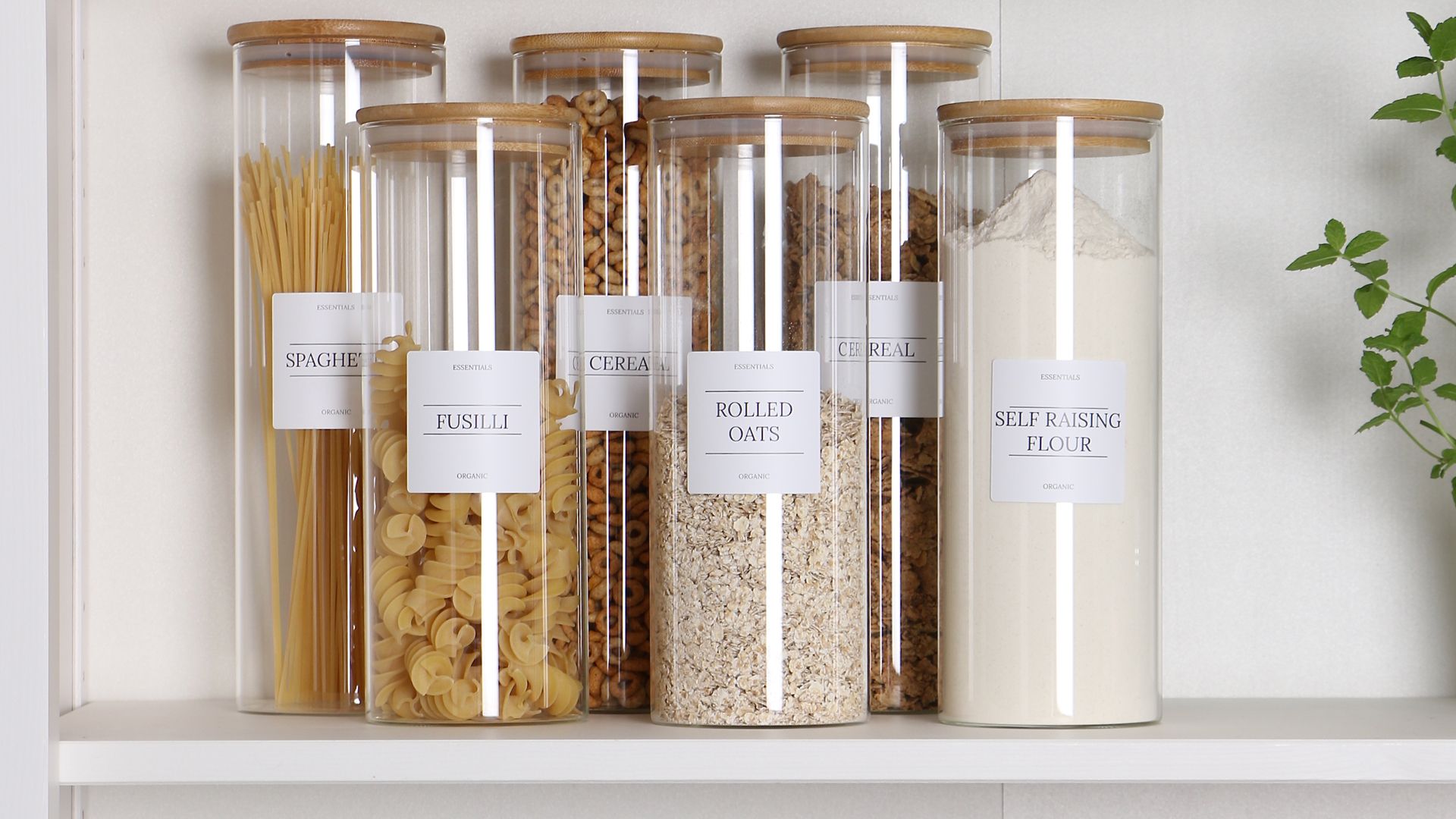 How to organize a pantry with labelled glass jars for storage for dried goods