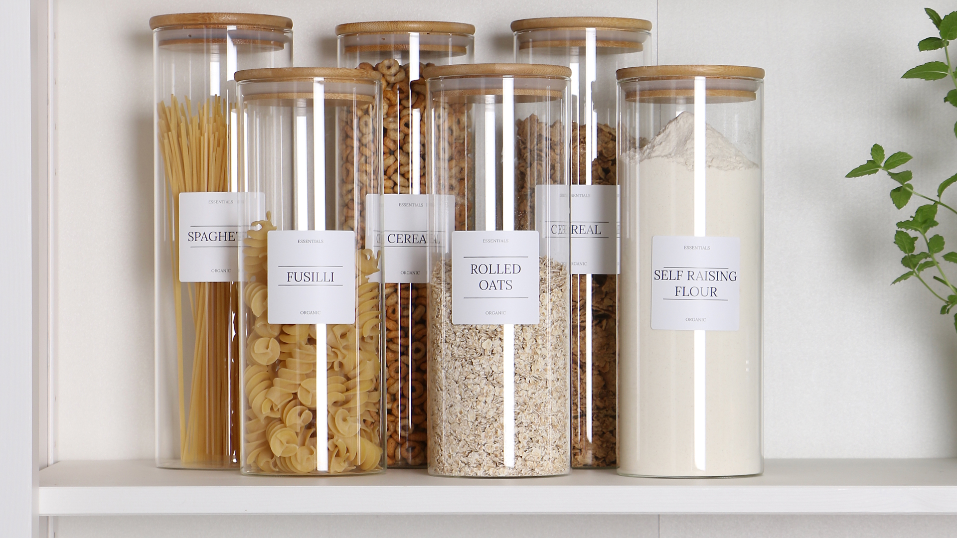 How to organize a pantry with labelled glass jars for storage for dried goods