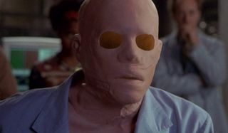 Hollow Man invisible Kevin Bacon wearing a plastic mask