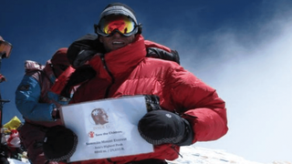 Vivian James Rigney at the summit of Everest