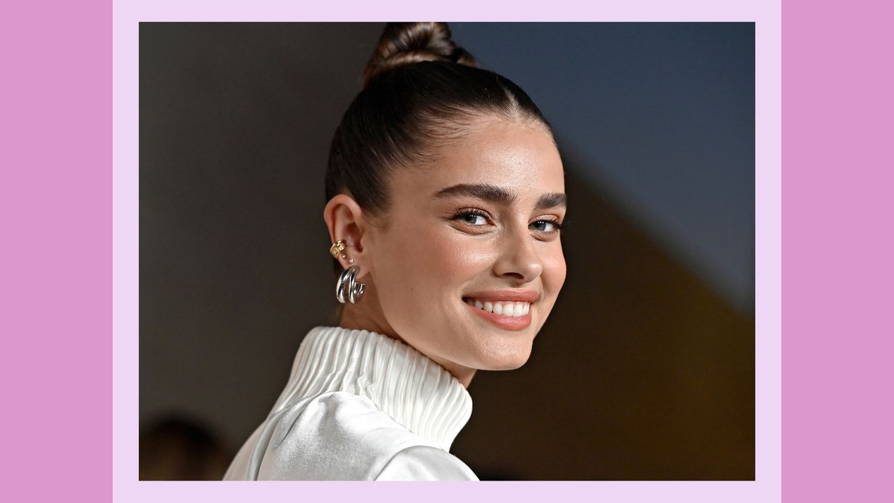 Taylor Hill attends the launch of Cote des Roses&#039; New Campaign, photographed by David LaChapelle and starring Taylor Hill at Milk Studios Los Angeles on April 29, 2022 in Los Angeles, California. Taylor Hill&#039;s makeup is glowy, with the model wearing a nude lipstick/ in a purple template