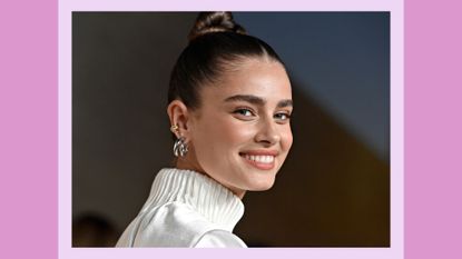 Taylor Hill attends the launch of Cote des Roses' New Campaign, photographed by David LaChapelle and starring Taylor Hill at Milk Studios Los Angeles on April 29, 2022 in Los Angeles, California. Taylor Hill's makeup is glowy, with the model wearing a nude lipstick/ in a purple template