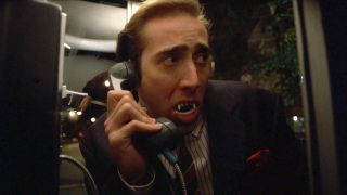 Nicolas Cage wearing vampire teeth in Vampire's Kiss