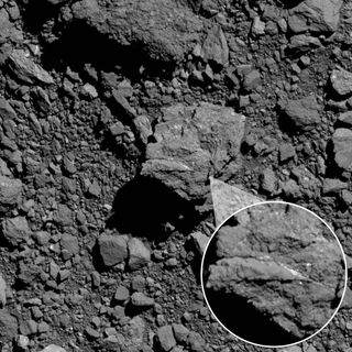 NASA’s OSIRIS-REx spacecraft captured this image of one of asteroid Bennu's boulders with a bright vein that appears to be made of carbonate.