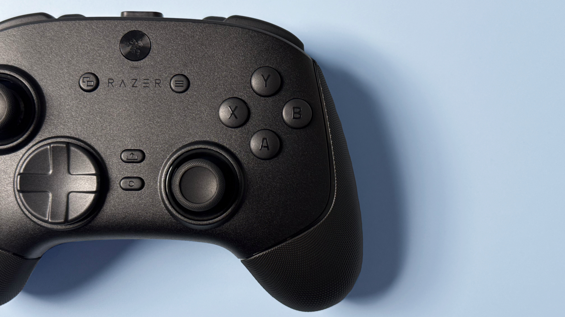 Razer Wolverine V3 Pro 8K Pro controller on a light blue background