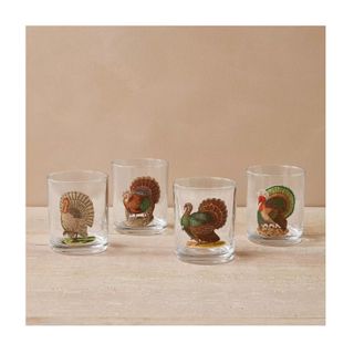 4 clear glasses with turkey picture