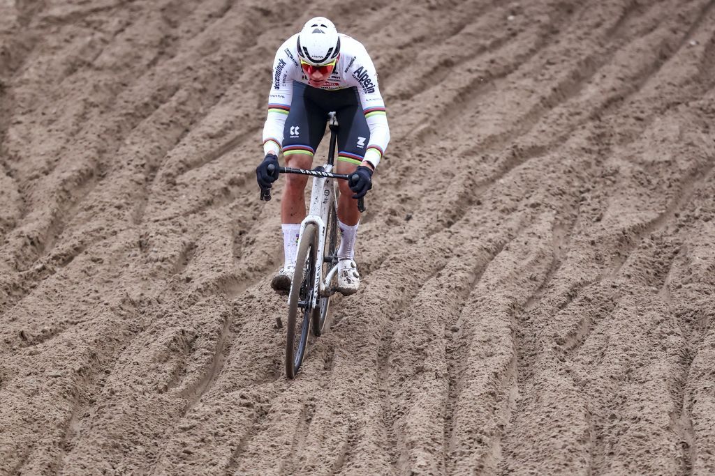 Dutch Mathieu Van Der Poel pictured in action during the men's elite race at the World Cup cyclocross cycling event in Zonhoven on Sunday 07 January 2024, stage 12 (out of 14) of the UCI World Cup competition. BELGA PHOTO DAVID PINTENS (Photo by DAVID PINTENS / BELGA MAG / Belga via AFP)
