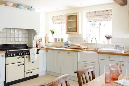 kitchen_cabinets_blue_wooden_blinds_range_cooker_floral_vintage_pastels.jpg