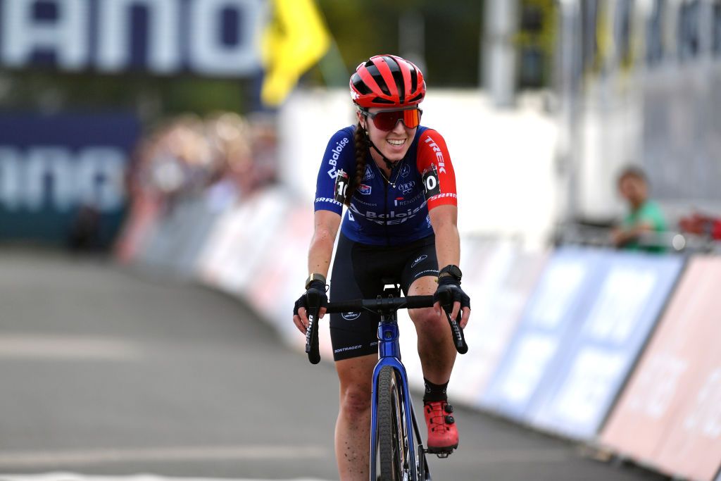 MAASMECHELEN BELGIUM OCTOBER 30 Shirin Van Anrooij of The Netherlands and Team Baloise Trek Lions crosses the finish line during the 1st UCI Cyclocross World Cup Maasmechelen Womens Elite CXWorldCup on October 30 2022 in Maasmechelen Belgium Photo by Luc ClaessenGetty Images