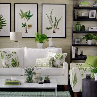 Cream sofas with decorative plant motif home decor