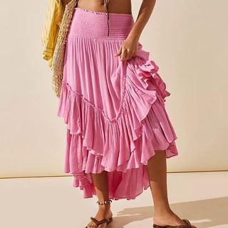 Free People model wearing pink convertible skirt