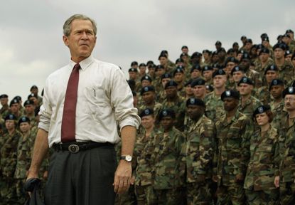 George Bush speaks to soldiers in 2002.