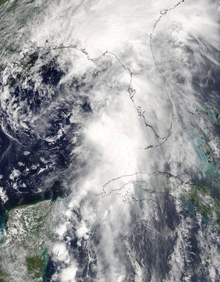 NASA's Terra satellite captured this visible light image of Tropical Storm Colin over the Gulf of Mexico on June 6 at 12:20 p.m. EDT (1620 GMT).