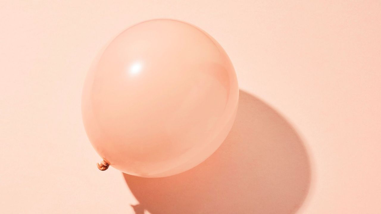 Studio shot of balloon with shadow background, representing what causes bloating