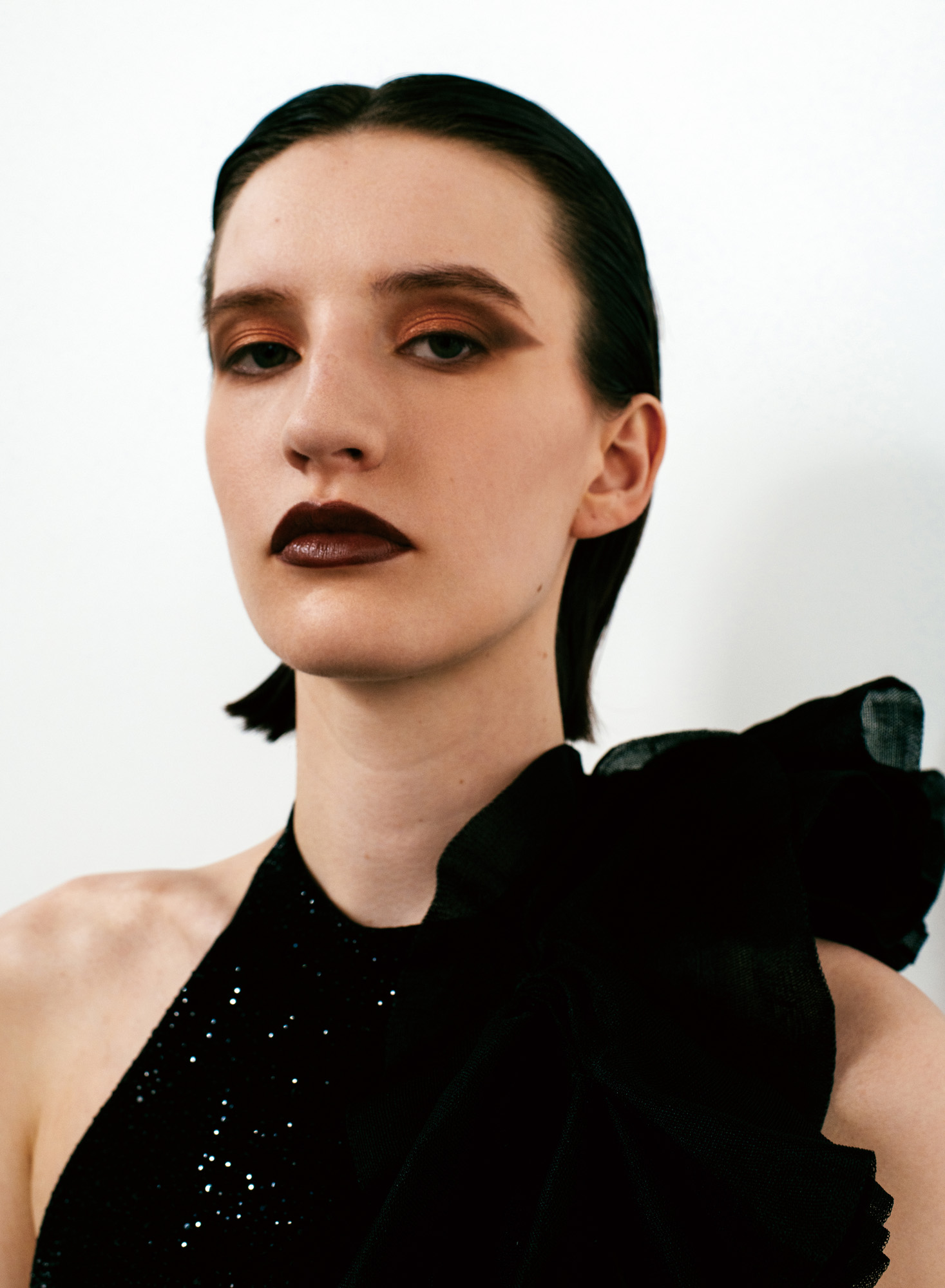 Close-up of model's face with lipstick