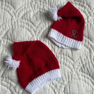 personalised gifts small knitted santa hats with an R embroidered on one