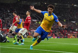 Che Adams celebrates his goal against Manchester United
