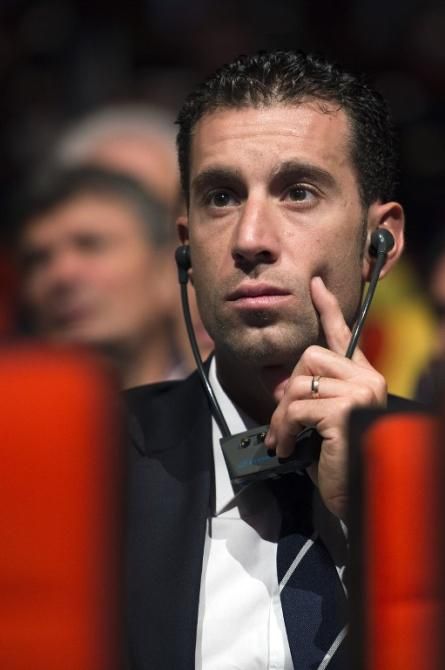 2014 Tour de France winner Vincenzo Nibali listens during the route presentation