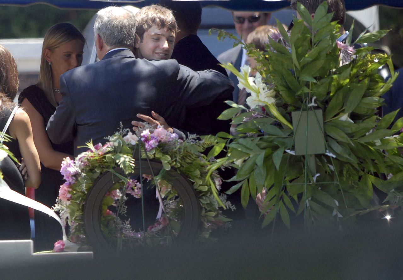 Burke Ramsey is hugged by his father