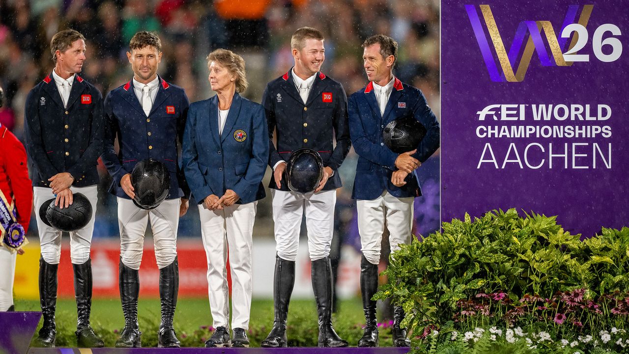 Four British riders and chef d&amp;rsquo;equipe Di Lampard stand on the podium after winning bronze at the showjumping World Championships