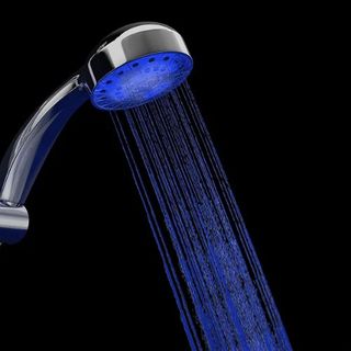 A light-up shower hand set with blue led lights and water cascading from the showerhead