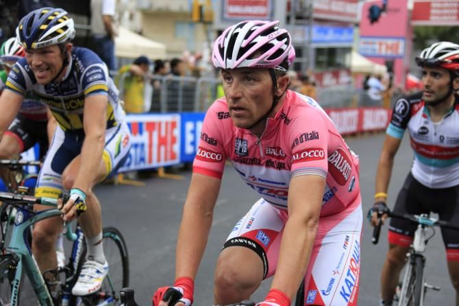 Luca Paolini (Katusha) made it through the crash-marred finale unscathed and remains in the maglia rosa
