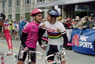 Road race world champion Greg LeMond (right) shares a joke with race leader Raul Alcala at the Tour de Trump in May 1990, with LeMond using his Scott Drop-In bars