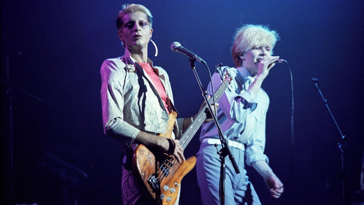 Mick Karn and David Sylvian of Japan perform on stage at Hammmersmith Odeon on May 17th, 1981 in London, England. 