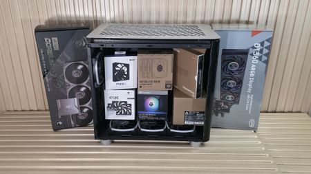 Case, fans and AIO on a desk