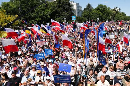 Protesters march in Poland against the government. 