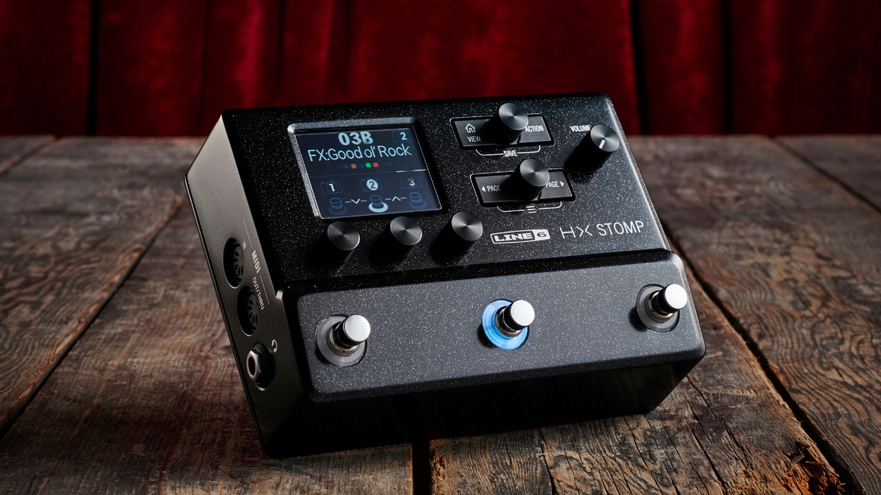 A Line 6 HX Stomp amp modeller on a wooden floor