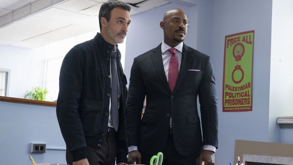 Reid Scott as Det. Vincent Riley and Mehcad Brooks as Det. Jalen Shaw in an office in Law &amp; Order season 23