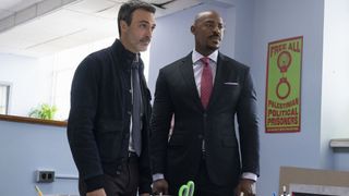 Reid Scott as Det. Vincent Riley and Mehcad Brooks as Det. Jalen Shaw in an office in Law & Order season 23