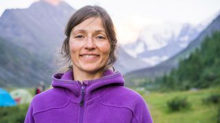 what is a fleece: female hiker close up in fleece