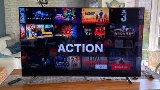 Sony A80L TV on a table showing a movie selection