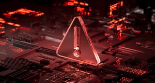 Ransomware mockup of a red neon motherboard with a floating triangular warning sign denoting danger