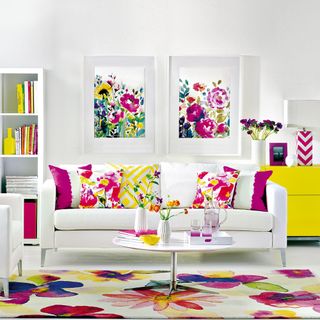 living room with white walls and florals photo frame