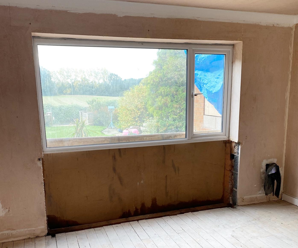 The former window in Laura's living room which overlooks the garden and fields
