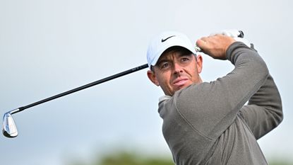 Rory McIlroy hits a driving iron at the 2024 Irish Open Pro-Am