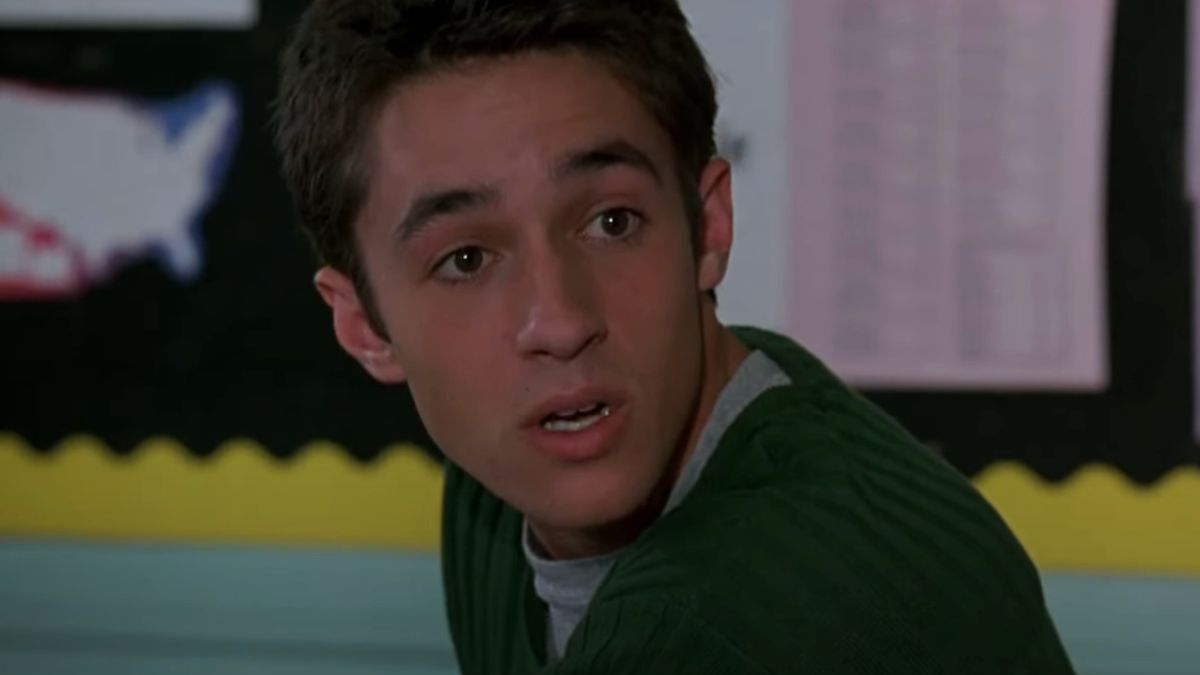 Thomas Ian Nicholas sits looking distressed in class in American Pie.