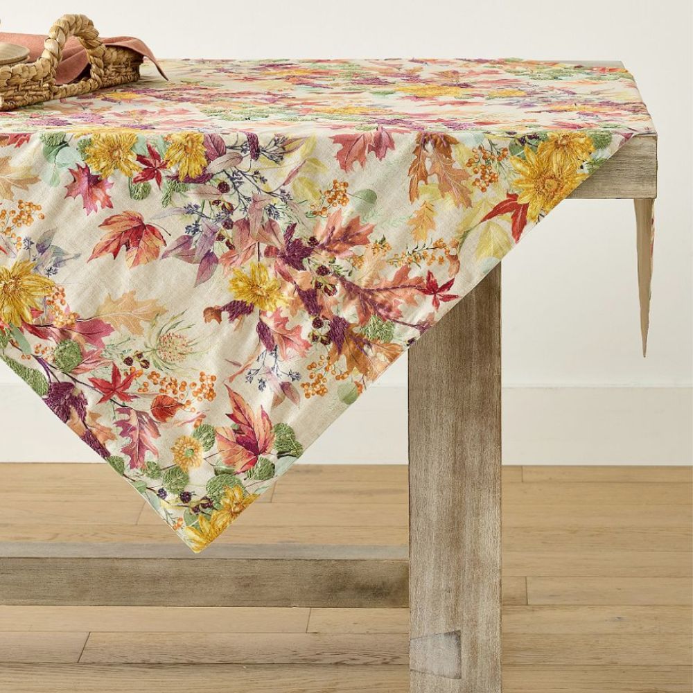 Table cloth embroidered with fall flowers, leaves and colors